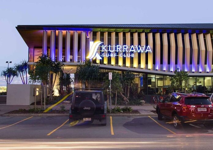 kurrawa surf club illuminated at dusk, a popular venue for dining and live events featured in what's on broadbeach