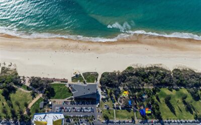 Before the city wakes: beach yoga and 6am coffee near Opus